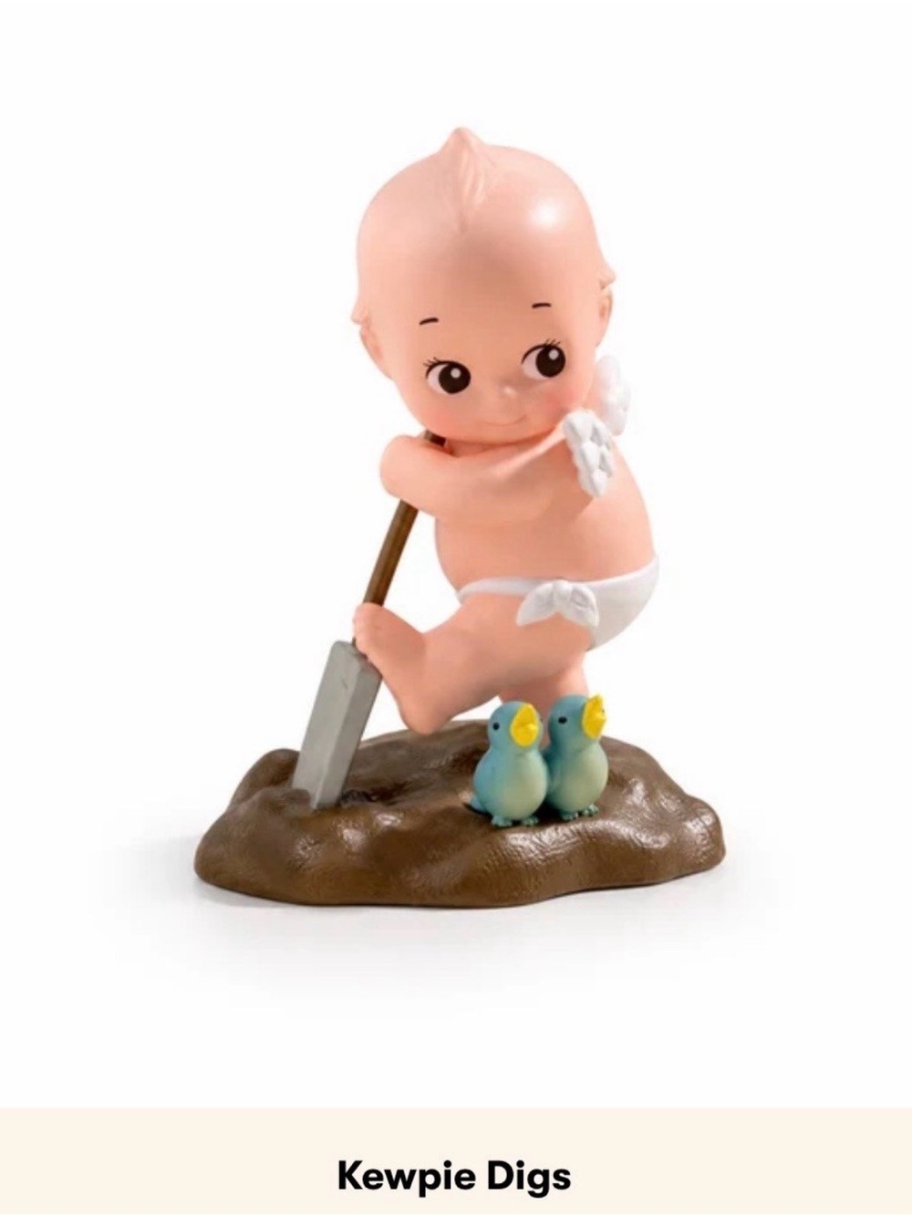 Kewpie in the garden; KEWPIE DIGS FIGURINE